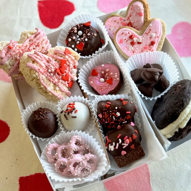 Large Valentine's Treat Box with various pink and chocolate desserts.