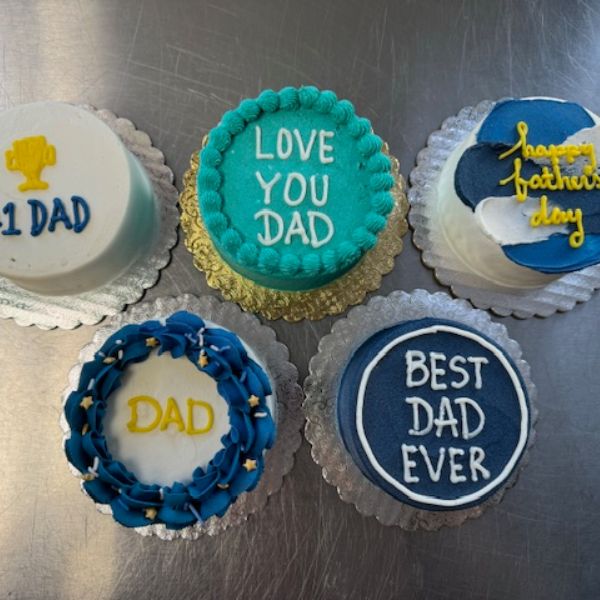 Five Father's Day Mini Cakes with various designs and messages for dads.