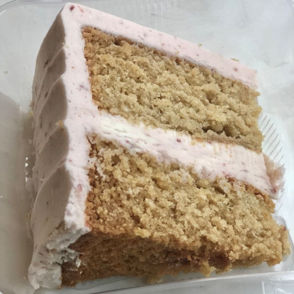 Slice of Vanilla Cake with Raspberry Jam Buttercream